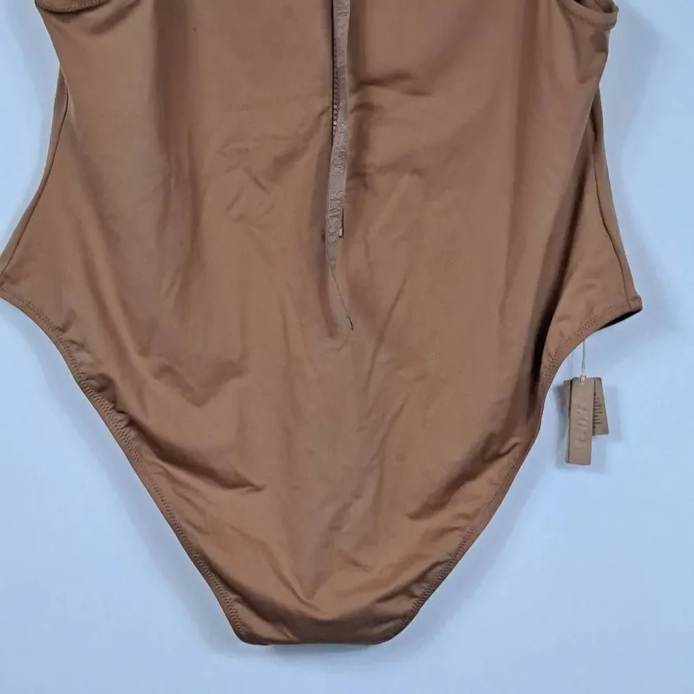 SKIMS‎ Swim mock neck cycle suit. NWT